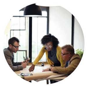 Feature image for the ESD Workshop: Anti-static Flooring – The Basics page - three architects sitting around a table discussing things