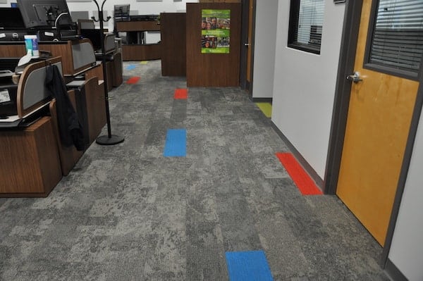 A completed installation of ShadowFX static-dissipative (ESD) carpet tile in a call center facility.