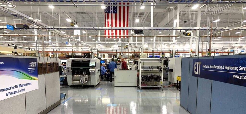 A completed installation of AmeriWorx conductive (ESD) vinyl tile flooring in an electronics manufacturing facility