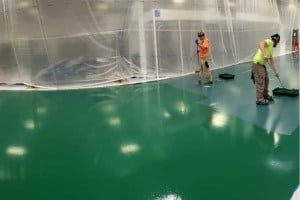 An in progress installation of GroundWorx Ultra generation 3 ESD epoxy flooring in an electronics manufacturing and assembly facility.