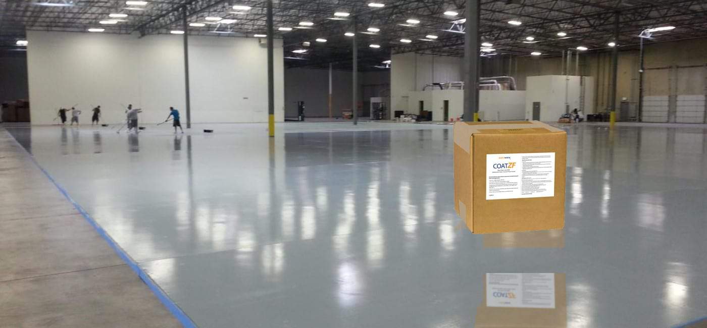 Banner background shows an installation of GroundWorx ESD epoxy flooring with CoatZF static-dissipative floor finish being applied. In the foreground is the box packaging for CoatZF.