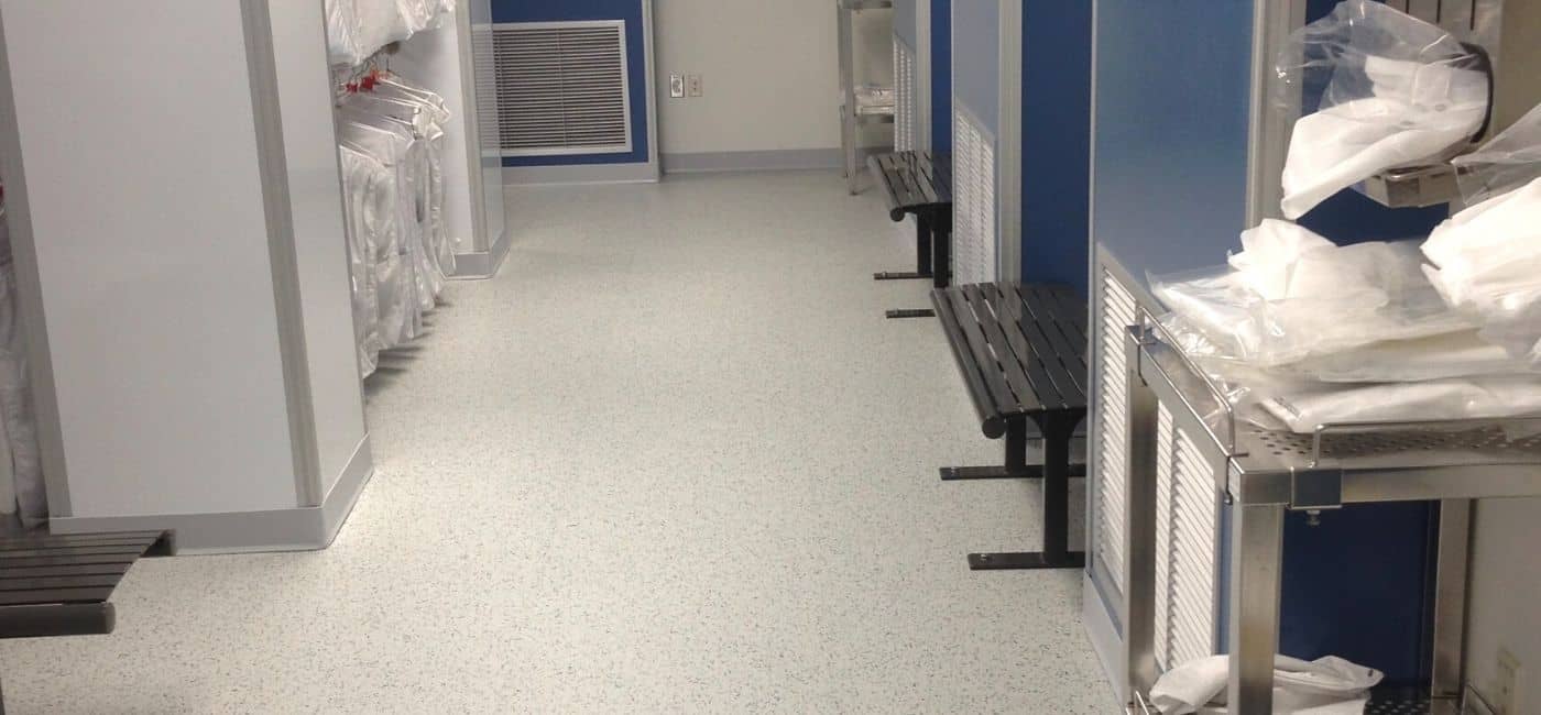 Photograph of an installation of GroundLock Extreme interlocking ESD tile in a cleanroom gown room facility.