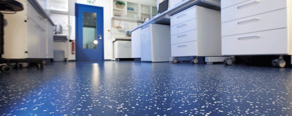 Completed installation of electrically conductive (ESD) rubber flooring in a laboratory