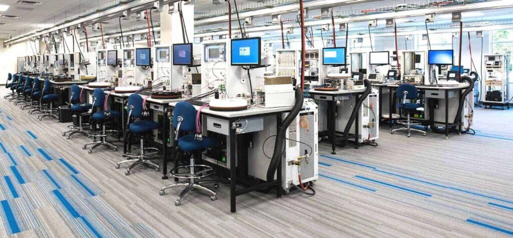 Photo is of a completed ShadowFX static-dissipative (ESD) carpet installation in an electronics manufacturing and assembly facility.