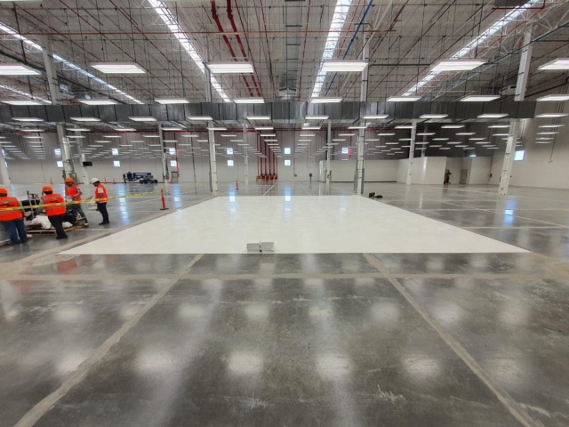 An area of installed AmeriWorx ESD vinyl tile waiting to be rolled