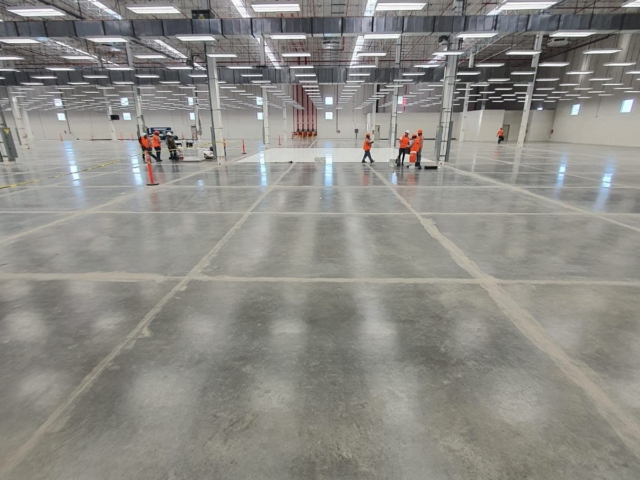 A wide shot of the space AmeriWorx ESD vinyl tile is being installed in