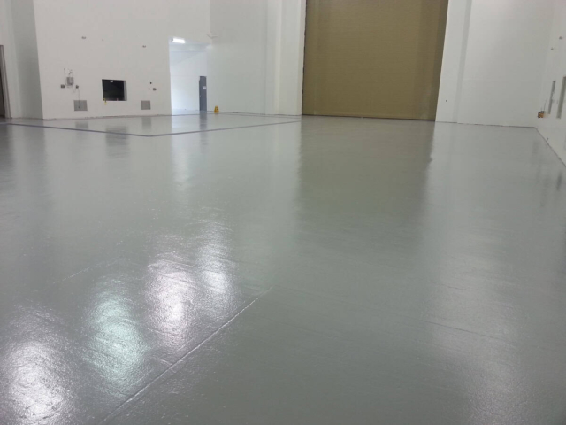 Installation of Generation 2 epoxy floor coating.