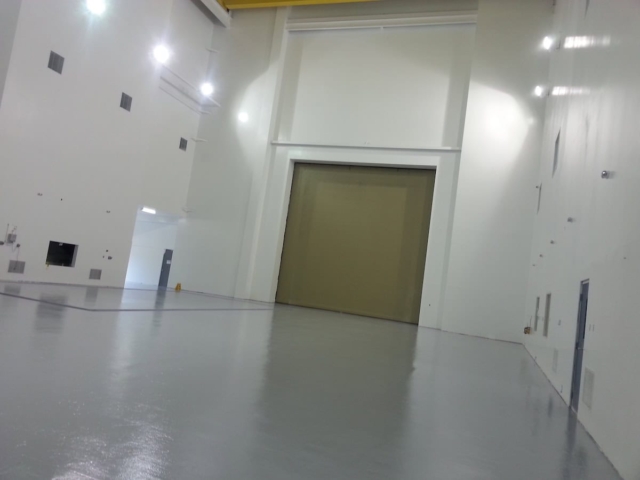 Installation of Generation 2 epoxy floor coating.
