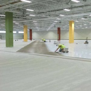 In progress installation of AmeriWorx conductive vinyl tile at an electronics manufacturing, aerospace and defence facility