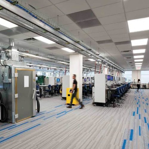 Photo is of a completed ShadowFX static-dissipative (ESD) carpet installation in an electronics manufacturing and assembly facility.
